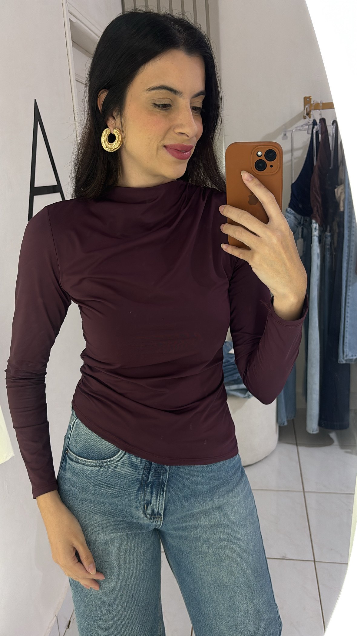 Blusa assimétrica manga longa